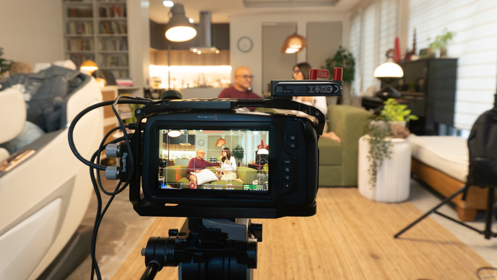 A Well and Wise filming setup framing a couch conversation